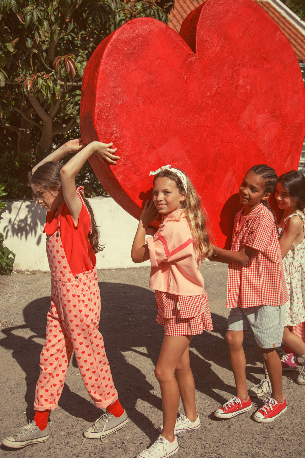 dungarees | pink w/ red hearts allover
